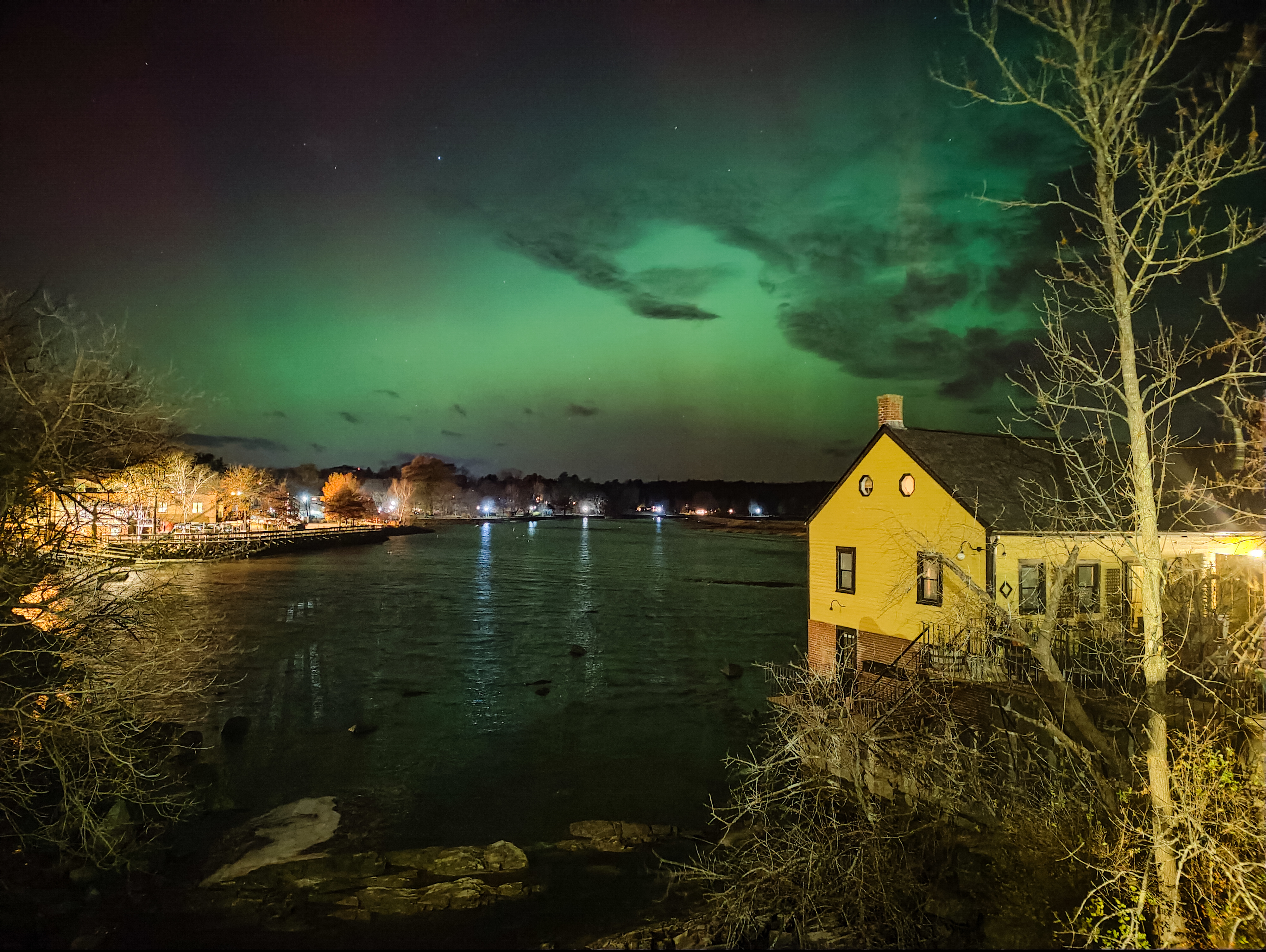 Northern Lights Over Waterfront House