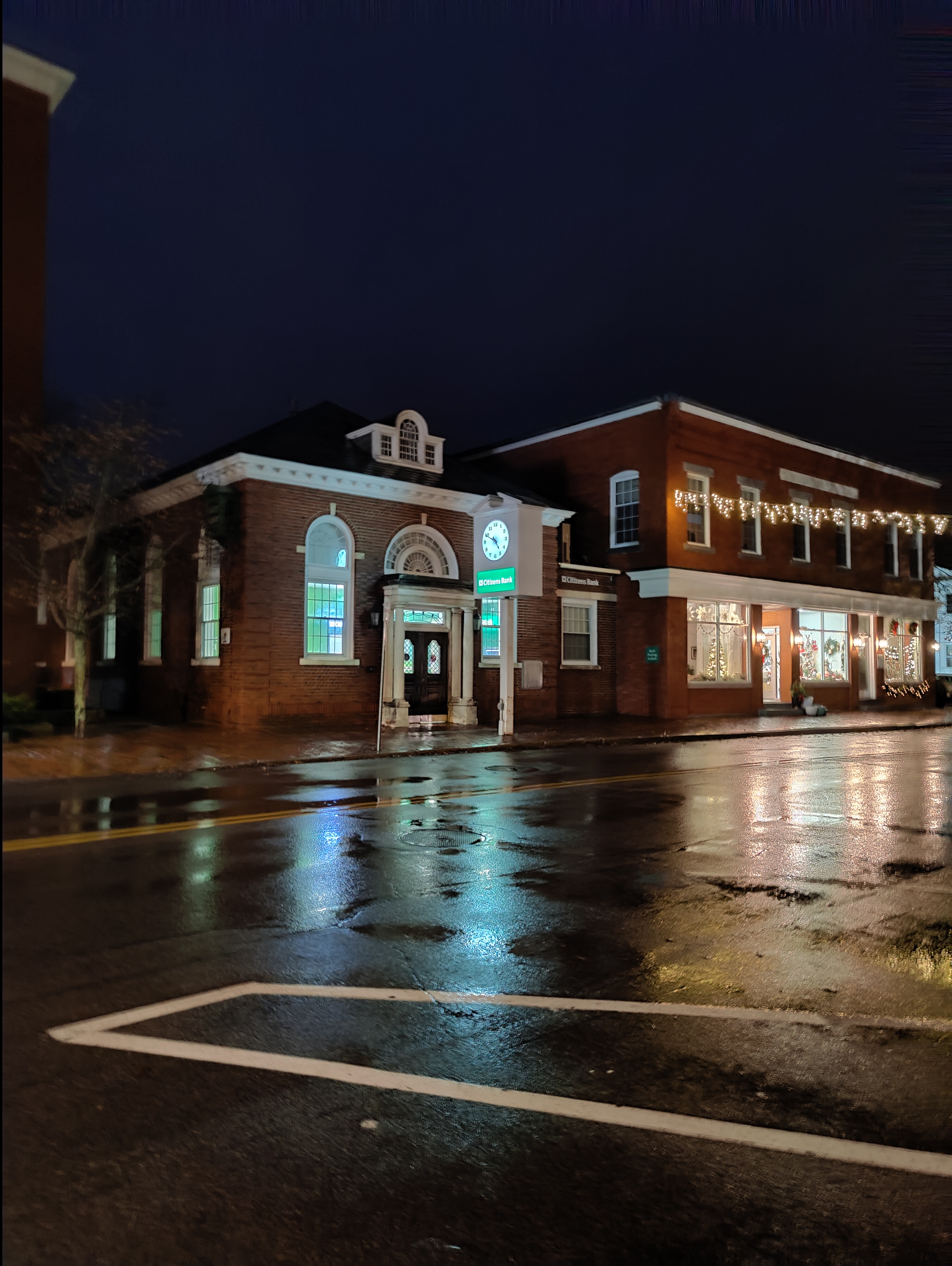 Historic Brick Bank Building on a Rainy Night